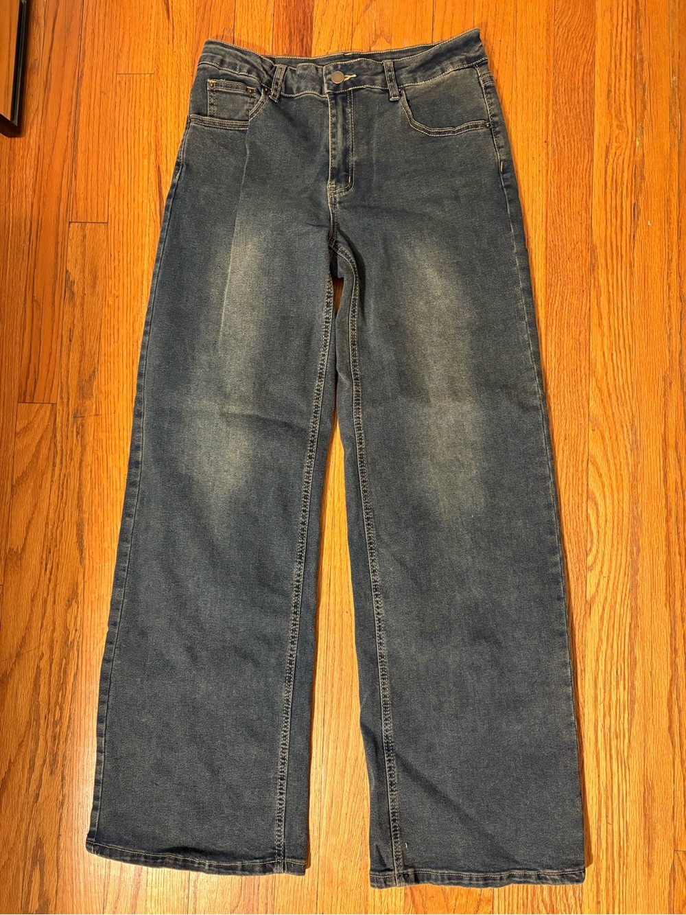 wide-leg dark blue jeans